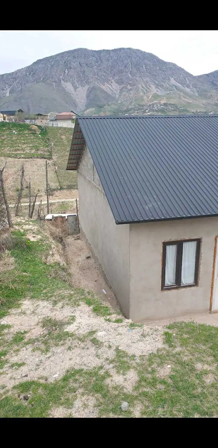 Постройка с земельным учвстком