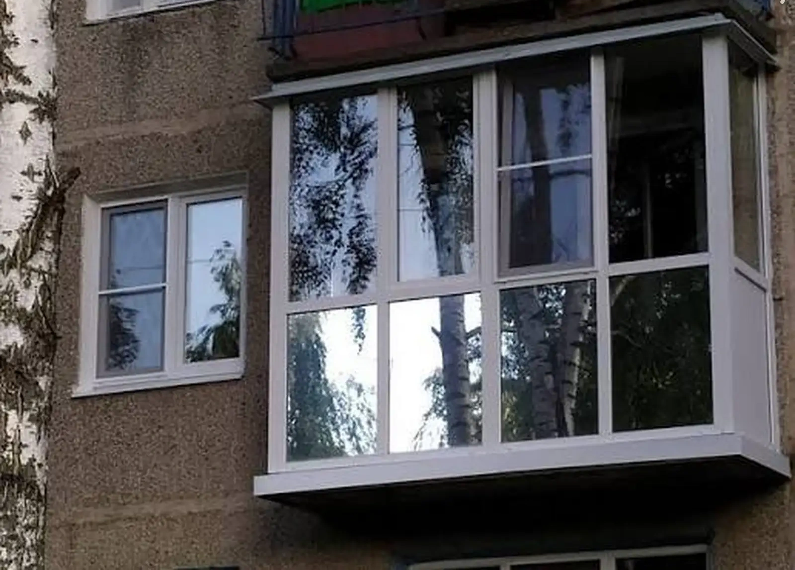 Услуги по обшивке балконов