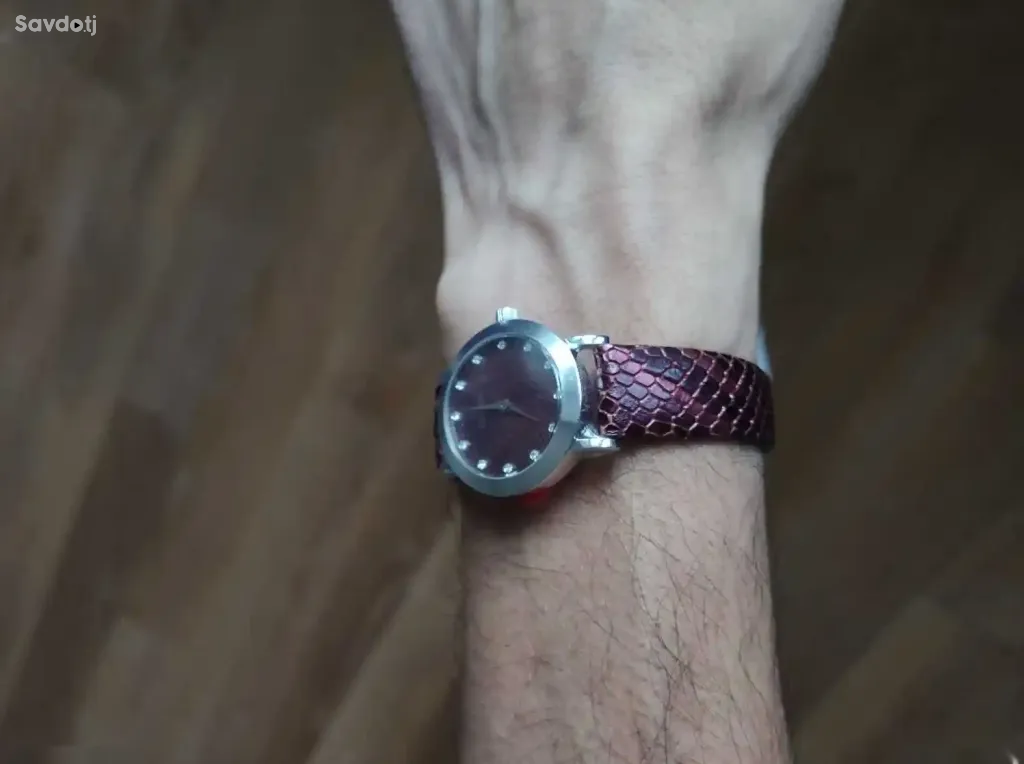 Серебряные часы Ника