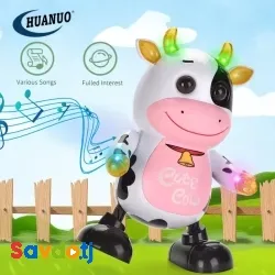 Электронная игрушка "Танцующая корова" с музыкой и световыми эффектами.