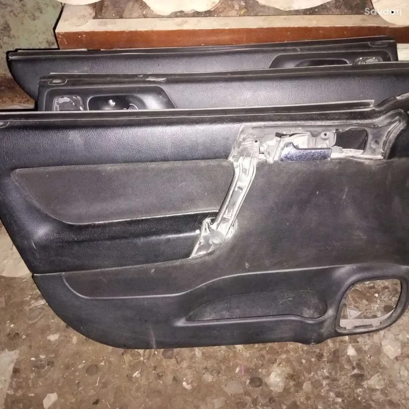 Обшивка дверь на Opel astra g