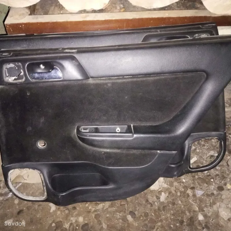 Обшивка дверь на Opel astra g