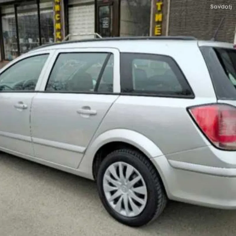 Лобовое стекло Opel Astra H 