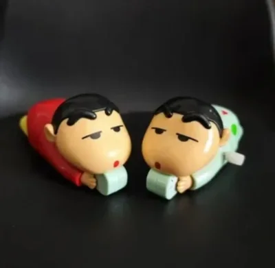 Человечка заводная игрушка — миниатюра 3