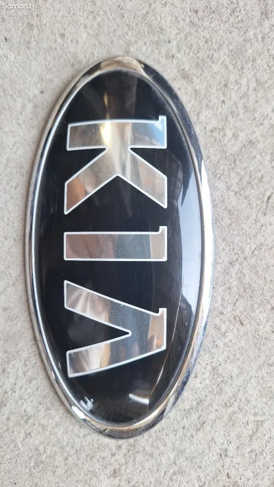 Знак Багажник Kia Carnival
