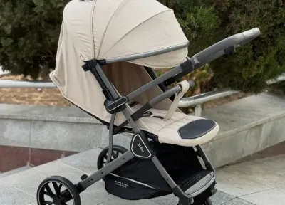 Коляска чемоданчик с перекидной ручкой